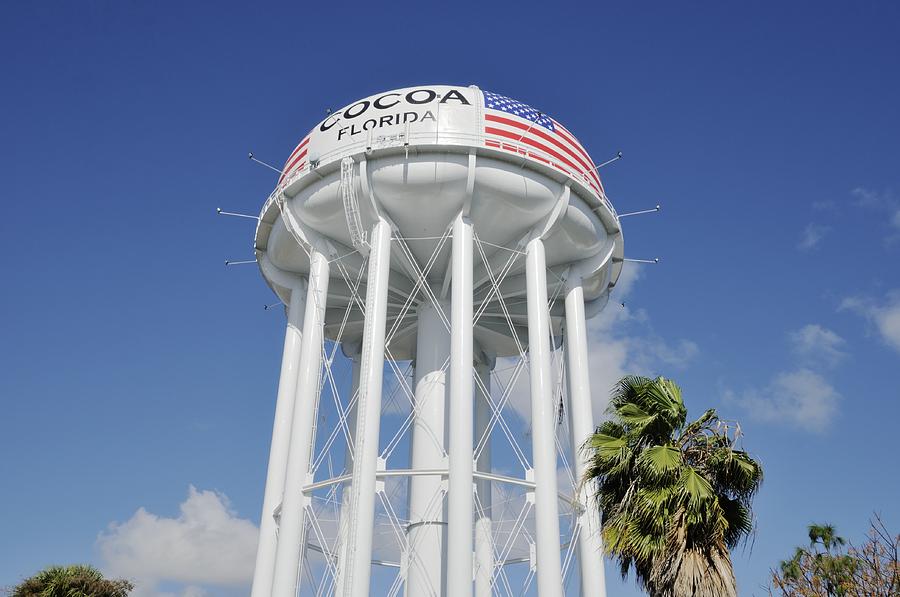 Cocoa Water Tower with American Flag Photograph by Bradford Martin