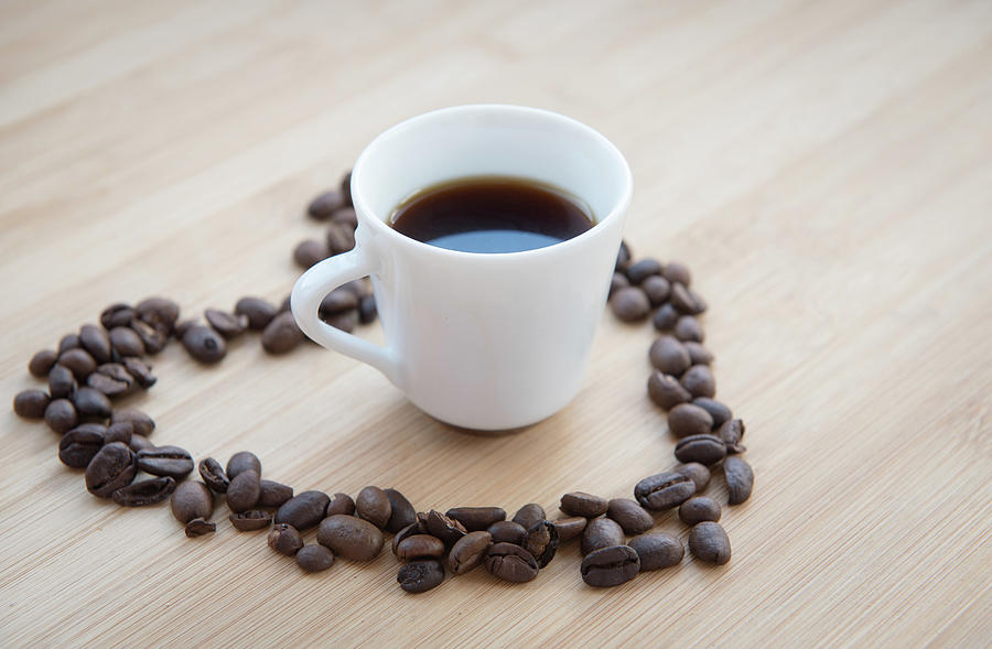 Coffee bean and black coffee inside a heart Photograph by Michalakis ...