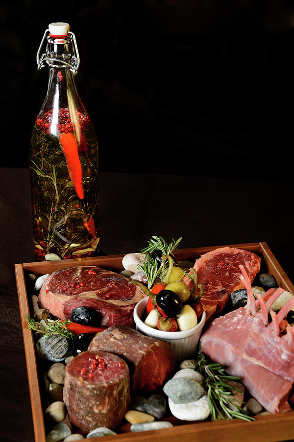 Bottle Photograph - Cold appetizer from meat allsorts to a holiday table by Yuliya Pravdyuk