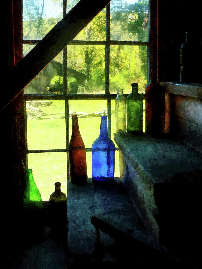 Colored Bottles On Steps Photograph by Susan Savad