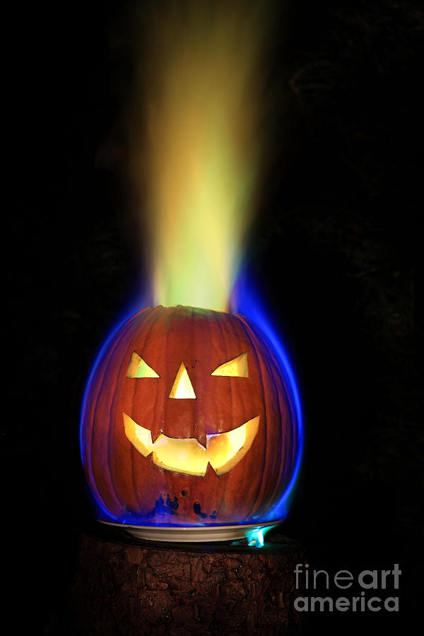 Colored Flame In Burning Pumpkin Photograph by Ted Kinsman