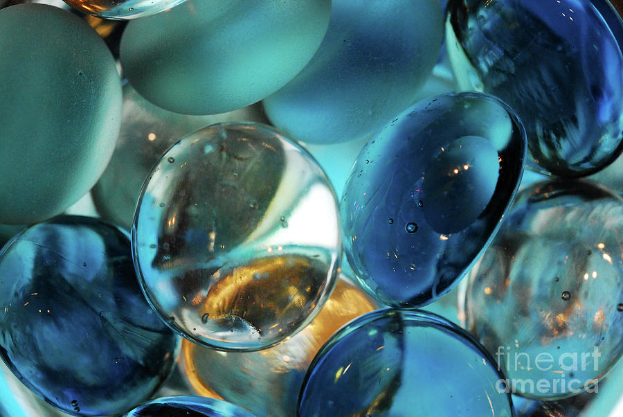 Colored Marbles and Water Photograph by Nancy Mueller