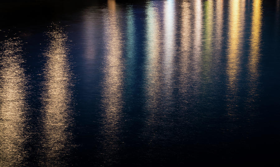 Colored water background from city lights Photograph by Michalakis Ppalis