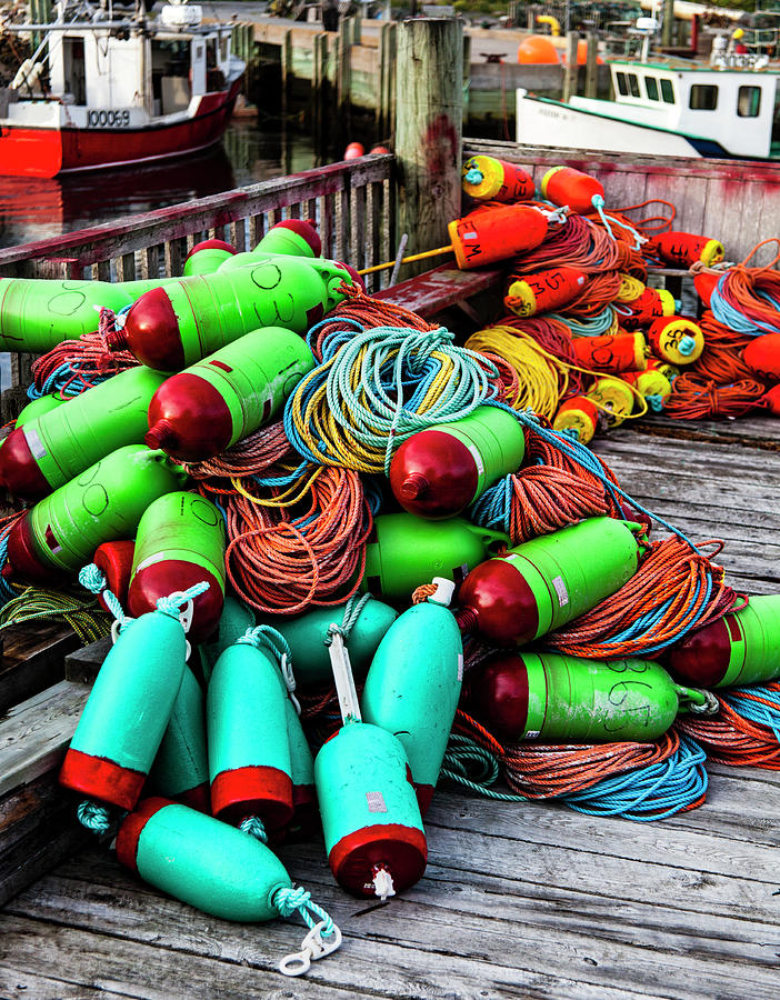 Boat Photograph - Colorful Buoys on the Wharf, Peggys Cove by Carol Leigh