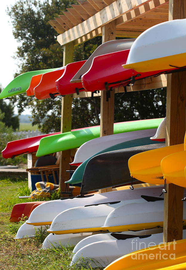 Colorful Canoes Photograph by Nadine Rippelmeyer