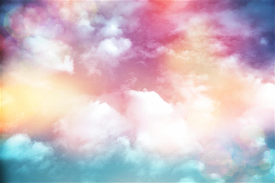 Colorful Clouds With Lens Flare Photograph by Serena King