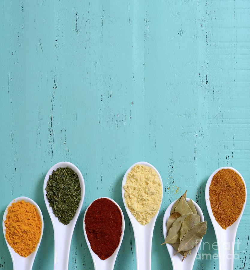 Colorful Cooking Spices On Wooden Table Photograph by Milleflore Images