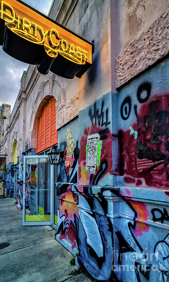 Colorful Graffiti And Dirty Coast Sign-nola Photograph