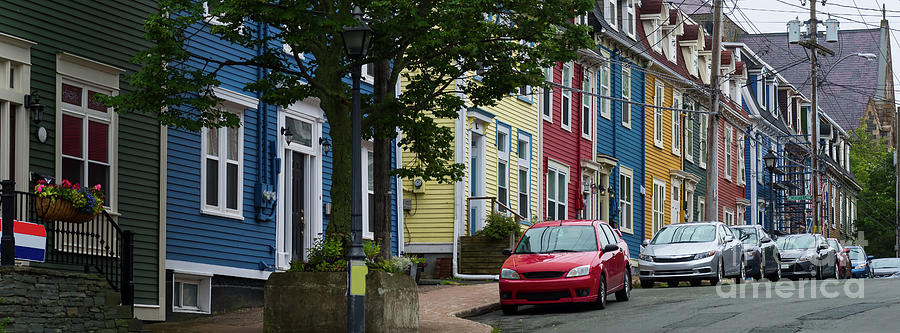 Colorful homes and cars in St. Johns Photograph by Les Palenik