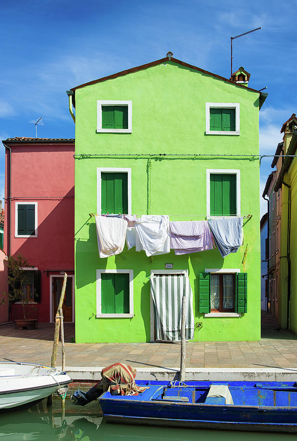 Colorful houses green and red in Burano Venice Italy Photograph by Matthias Hauser