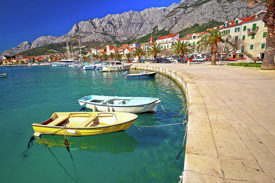 Colorful Makarska boats and waterfront under Biokovo mountain vi Photograph by Brch Photography