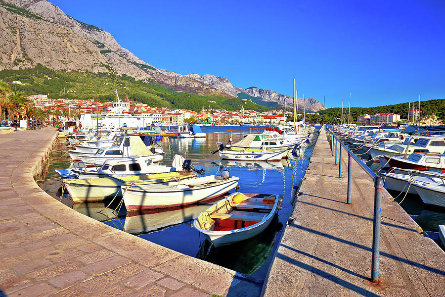 Colorful Makarska harbor and waterfront under Biokovo mountain v Photograph by Brch Photography