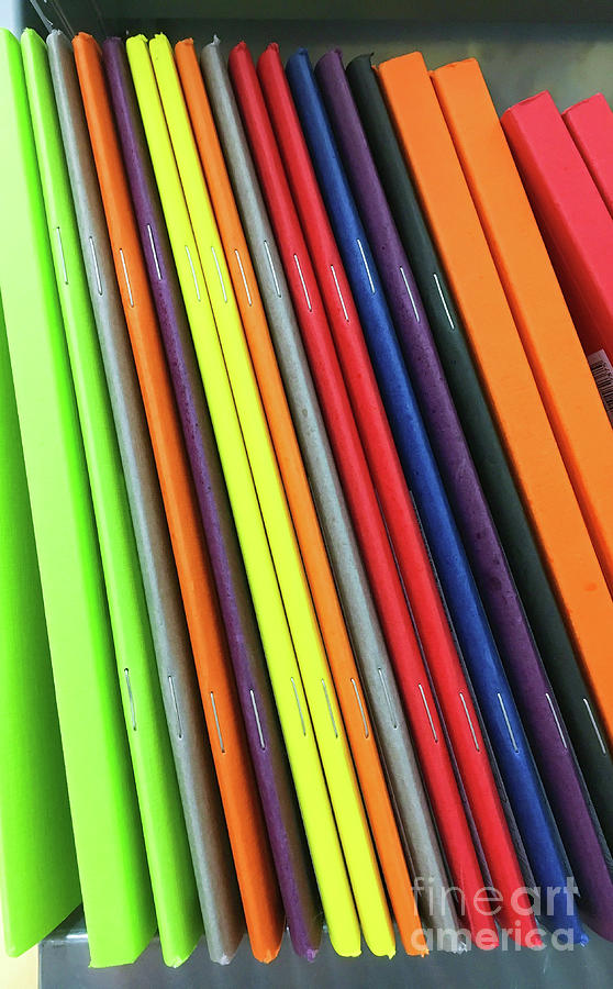 Colorful notebooks Photograph by Tom Gowanlock