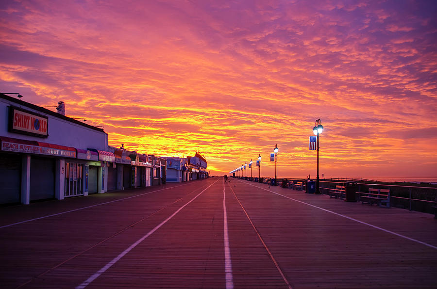 Colorful Skies on the Ocean City Boardwalk Photograph by Bill Cannon
