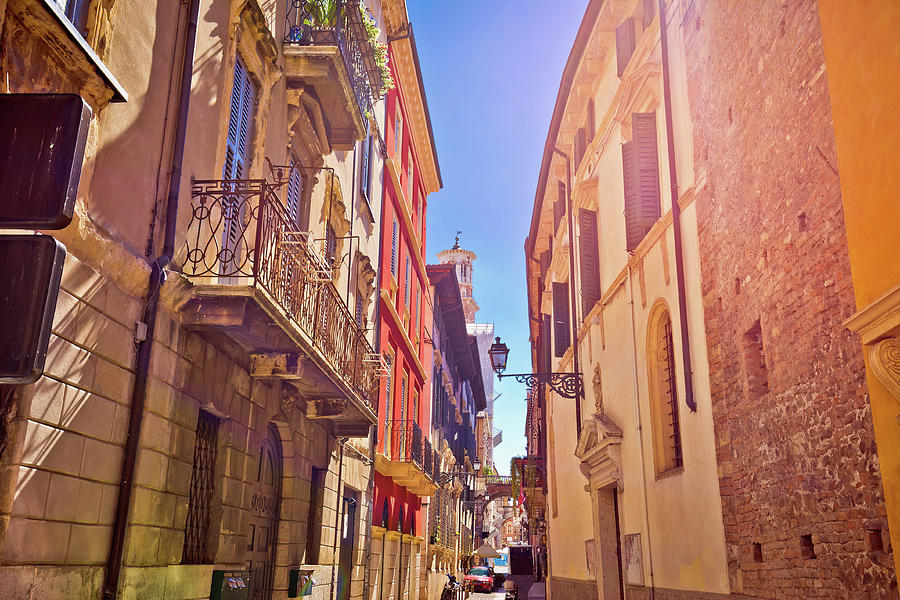 Colorful street of Verona in sun haze view Photograph by Brch Photography