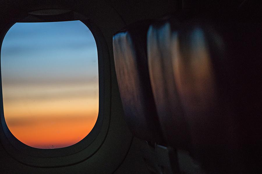Colorful Sunrise In Airplane Window Photograph by Alex Grichenko