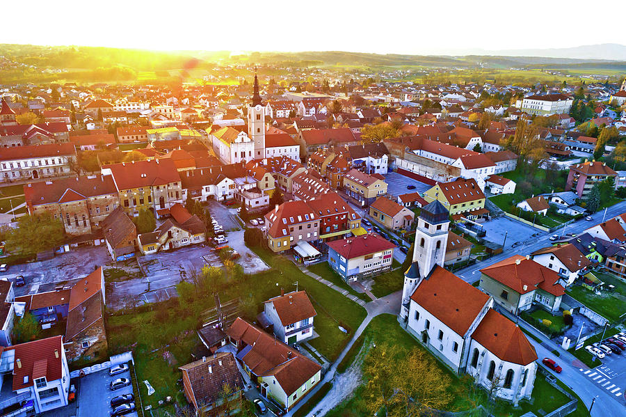 Colorful sunset above medieval town of Krizevci aerial view Photograph by Brch Photography