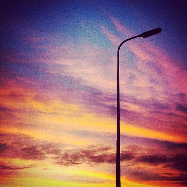 Sunset Photograph - Colorfull Streetlight #sky #clouds by Gossen Rijkeboer