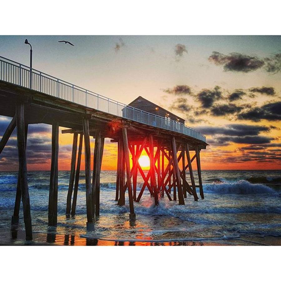 Seagull Photograph - Colors And Clouds over Fishing Pier by Lauren Fitzpatrick