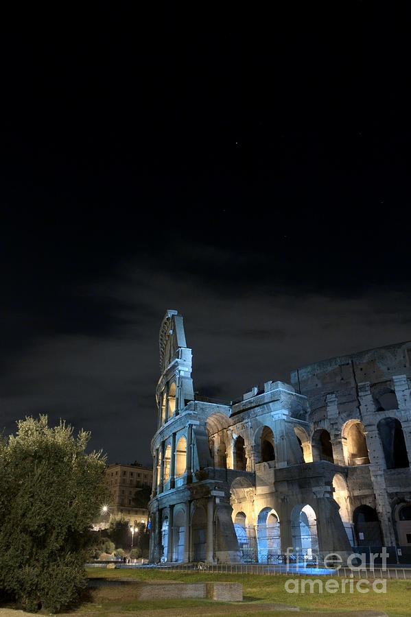 Colosseum by night I Photograph by Fabrizio Ruggeri