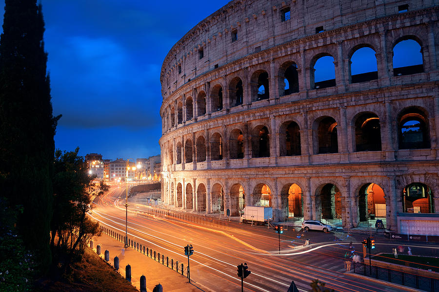 Colosseum in Rome at night Photograph by Songquan Deng