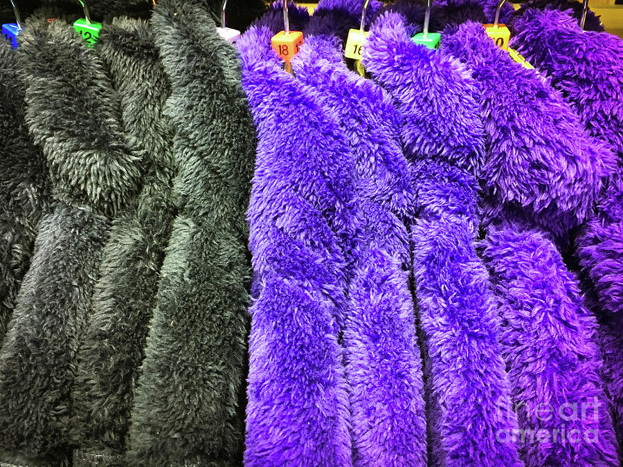 Colourful fleece tops Photograph by Tom Gowanlock