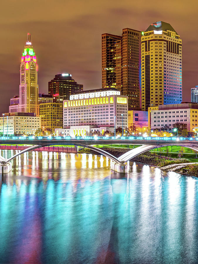 Columbus Skyline Photograph - Columbus Skyline Reflecting on Blue Waters by Gregory Ballos