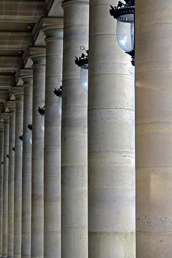 Columns and Lights Lined Up In A Row In Paris, France Photograph by Rick Rosenshein