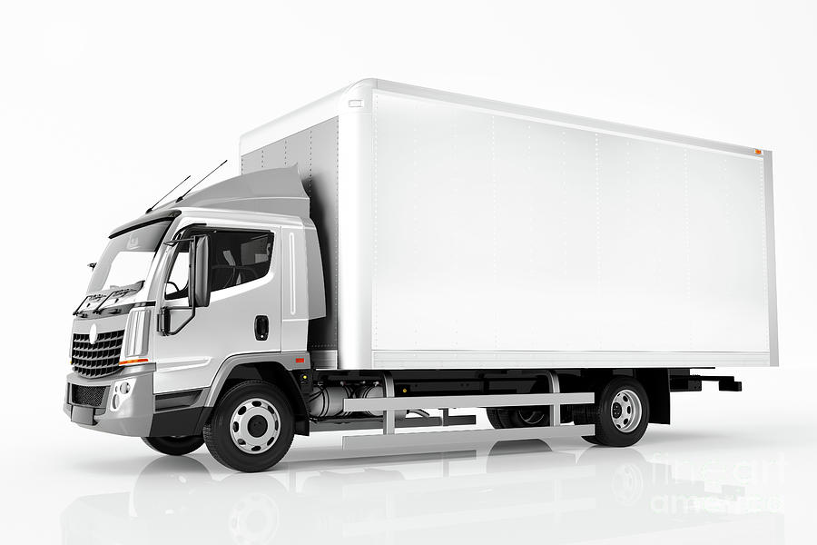 Commercial cargo delivery truck with blank white trailer. Generic, brandless design. Photograph by Michal Bednarek