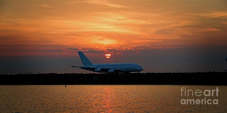 Commercial Jet Aircraft at Sunset Photograph by Geoff Childs