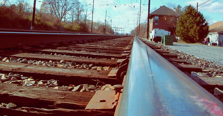 Commuter train tracks, Downingtown, Pa. Photograph by Gerald Salamone