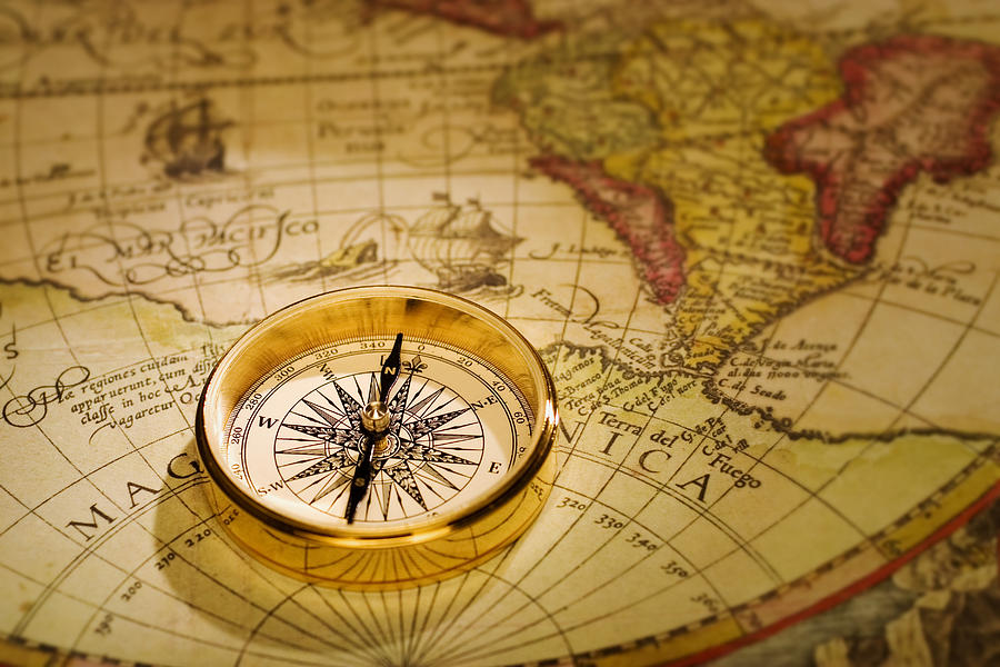 Compass And Antique Map Photograph