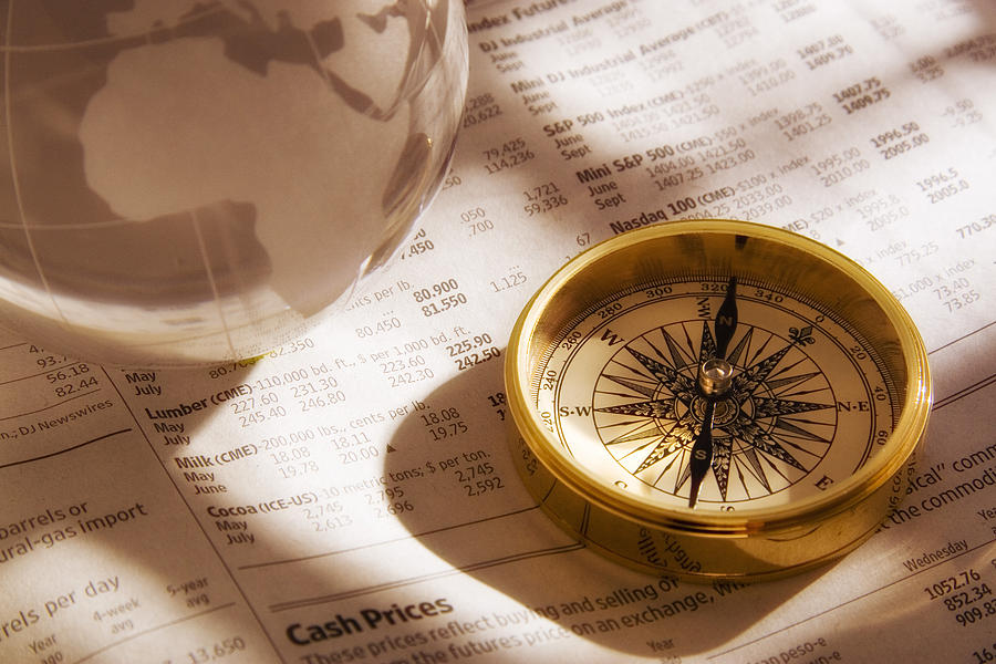Compass and Financial Page Photograph by Douglas Pulsipher