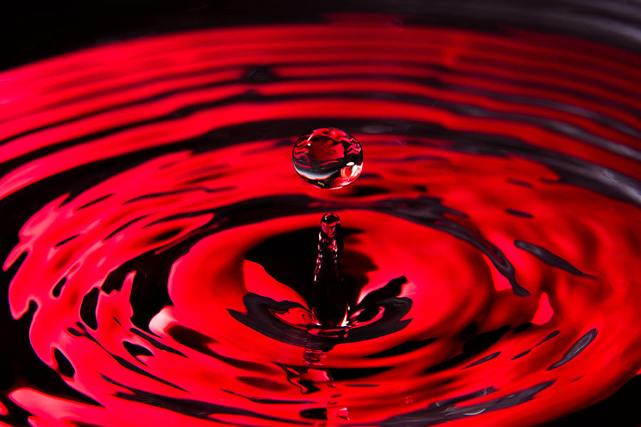 Concentric Ruby Water Drop Photograph