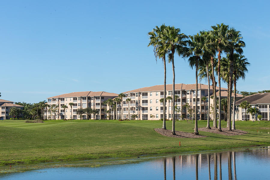Condos on a golf course Photograph by Josef Pittner