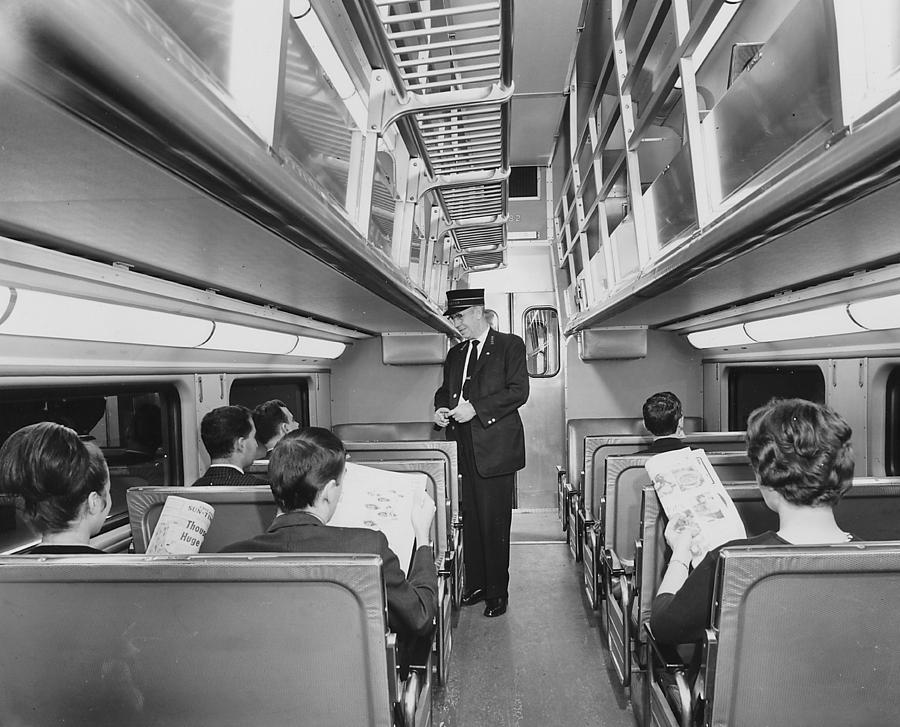Conductor Collects Ticket at Start of Journey Photograph by Chicago and North Western Historical Society