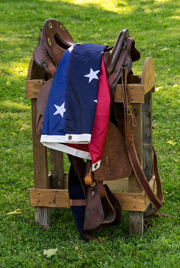 Confederate Flag and Saddle Photograph by Douglas Barnett