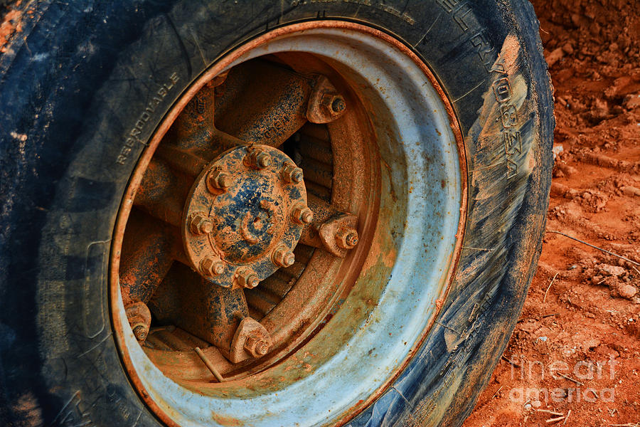 Construction Tire to tired to move covered in clay -Georgia Photograph by Adrian De Leon Art and Photography