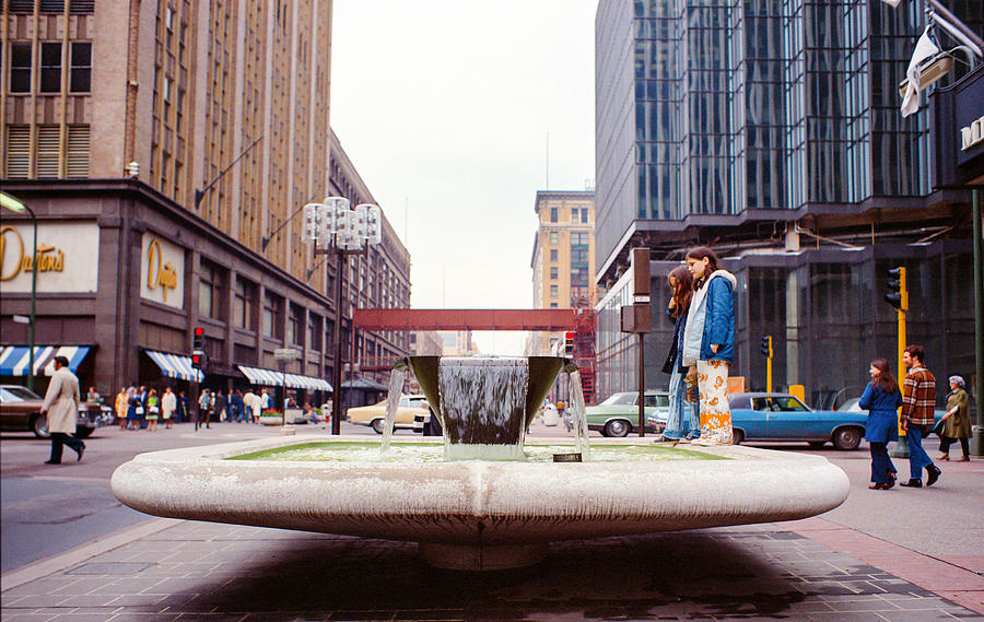 Contemplating the fountain at 8th and Nicollet. Photograph by Mike Evangelist