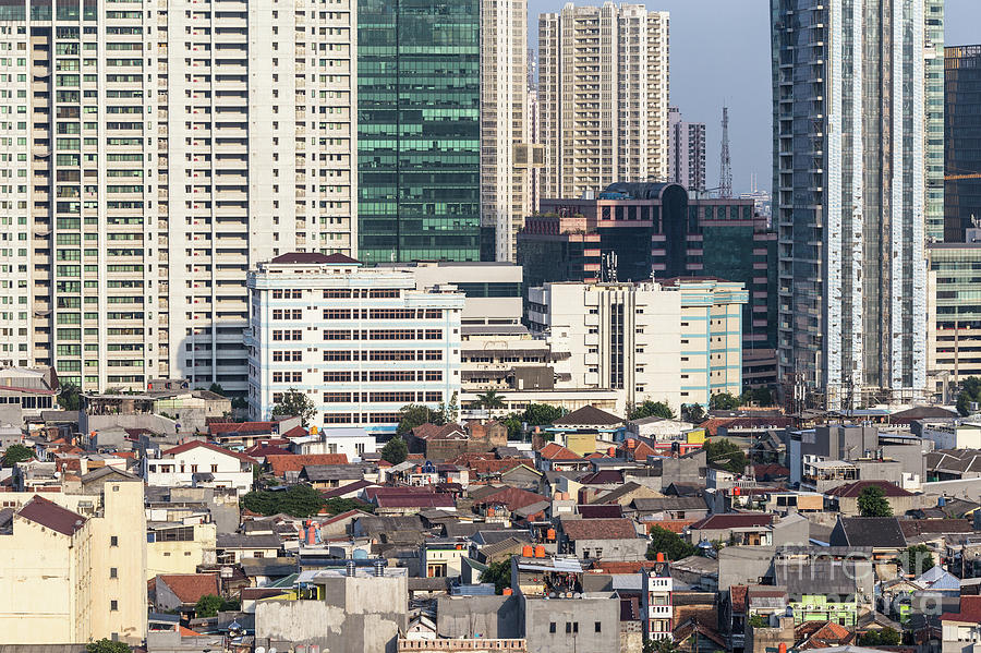 Contrast in residential district in Jakarta, Indonesia capital c Photograph by Didier Marti