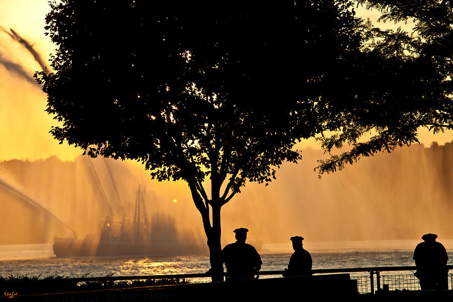Independence Day Photograph - Cops watch a Fireboat on the Hudson River by Chris Lord