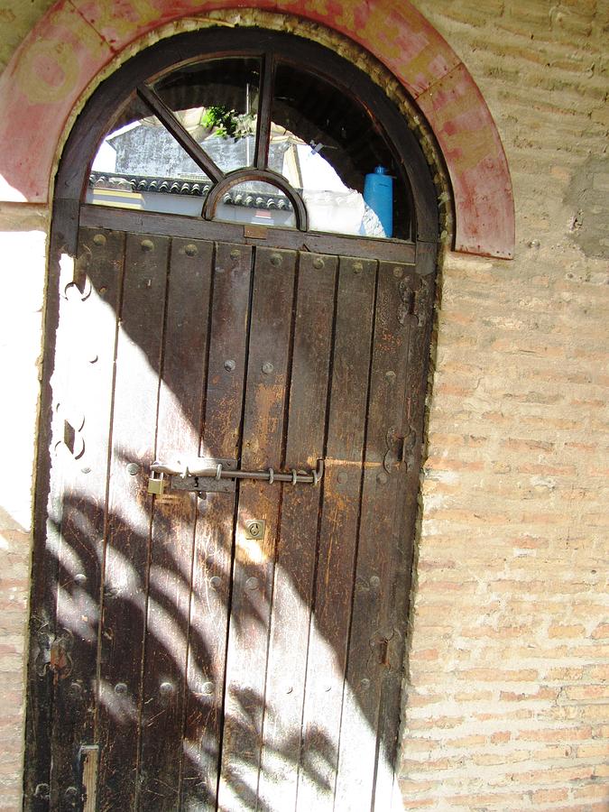 Cordoba Antique Crooked Wooden Door Spain Photograph by John Shiron