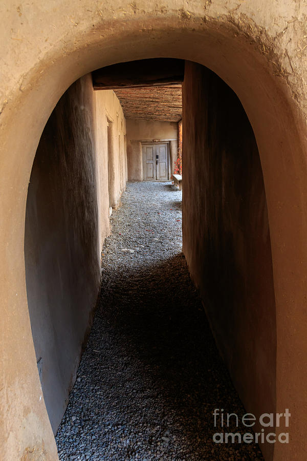 Corridor and arched doorway at La Hacienda del los Martinez Photograph by Richard Smith