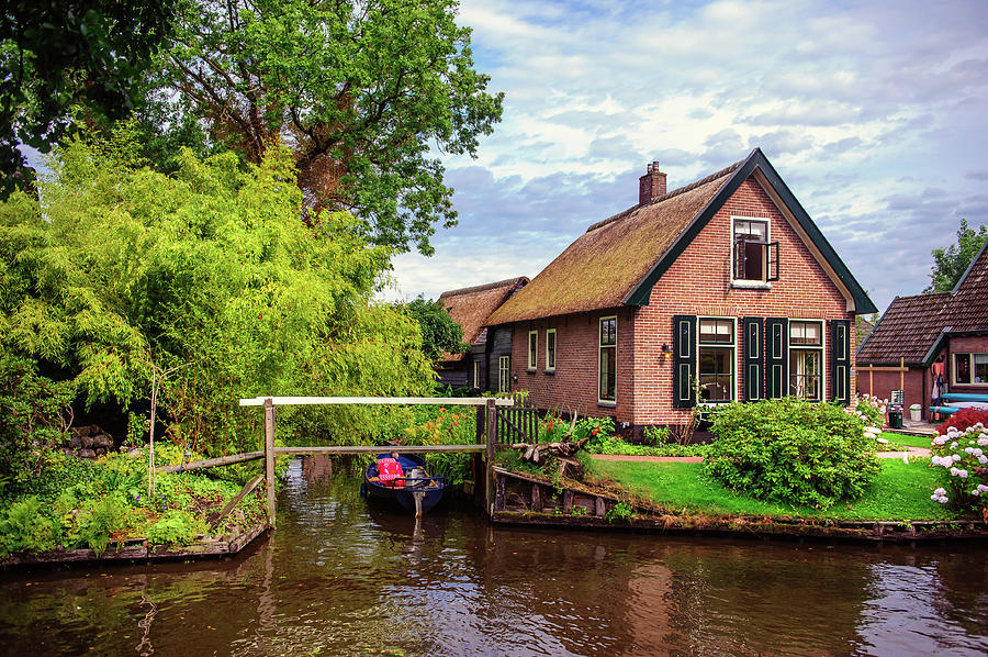 Cottage at Canal in Giethoorn Photograph by Jenny Rainbow
