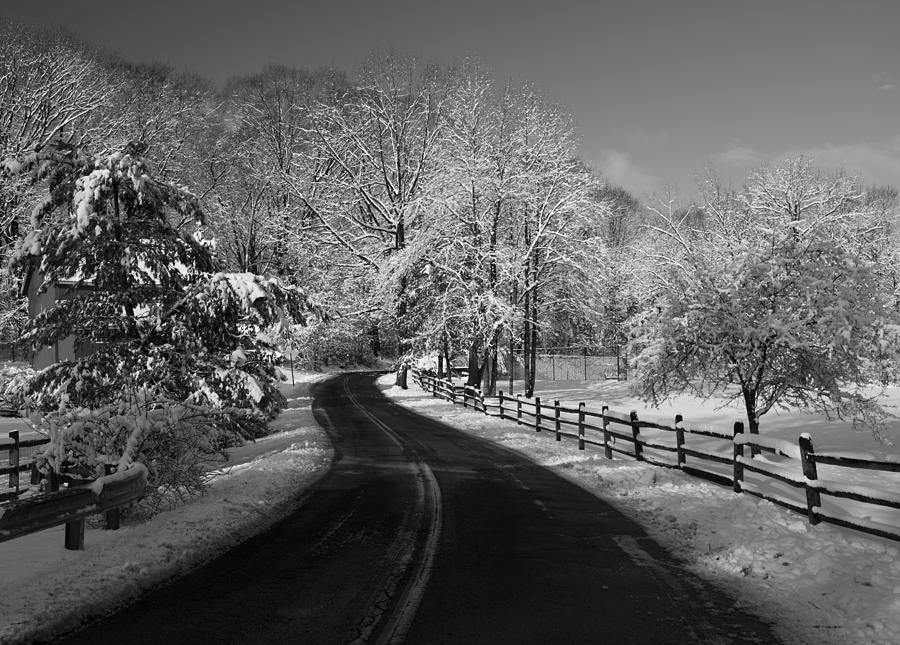 Country Road in Snow Rendered in Blackand White Photograph by Paul Ross