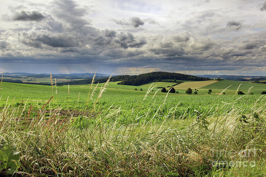 Countryside with rainy clouds Photograph by Michal Boubin