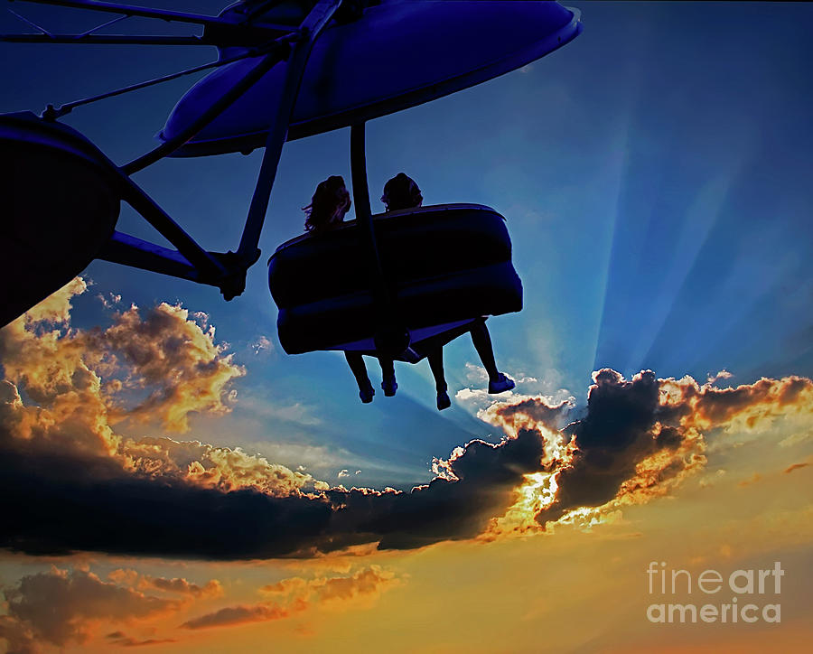 County fair amusement ride sunset  Photograph by Tom Jelen