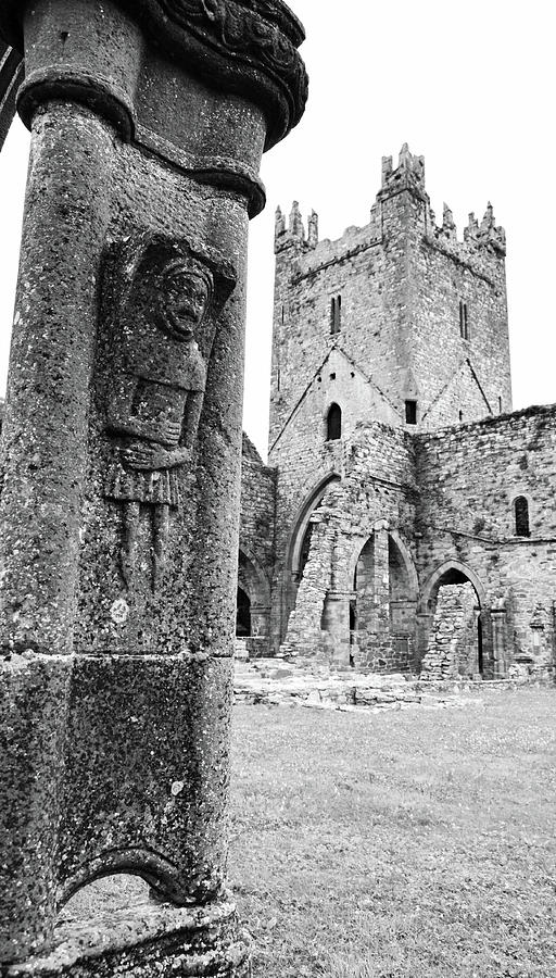 County Kilkenny Jerpoint Abbey Ruins Ireland Tower and Cloister Column Stone Carving Black and White Photograph by Shawn OBrien
