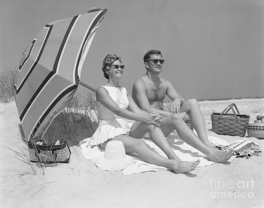 Holiday Photograph - Couple At The Beach, C.1960s by H. Armstrong Roberts/ClassicStock