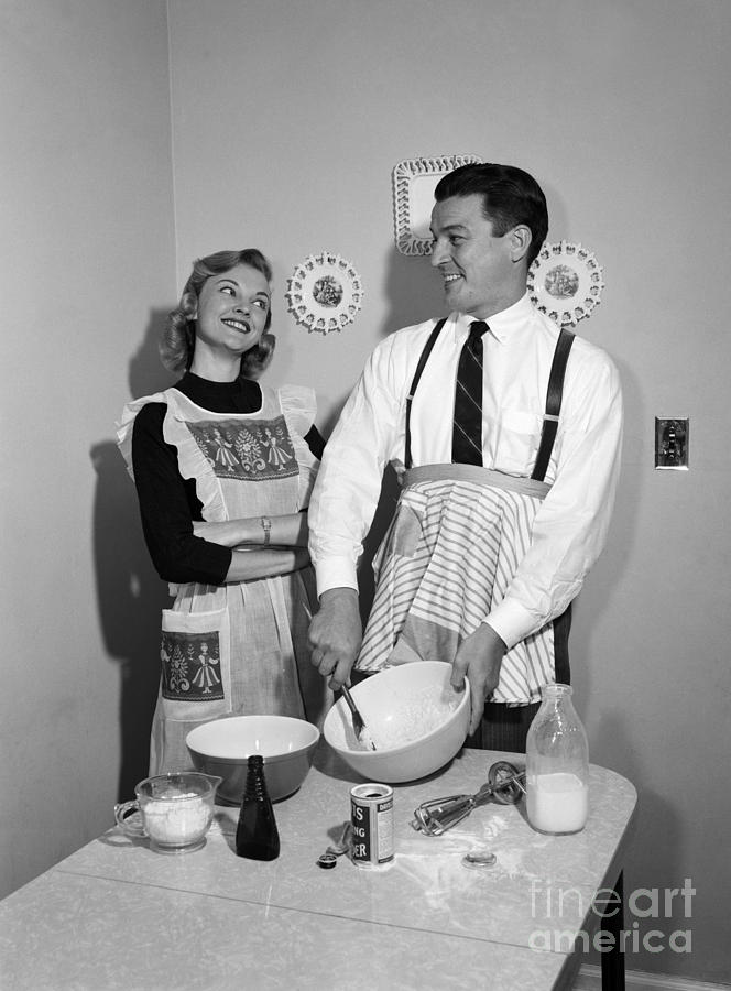 Couple Baking, C.1950s Photograph by Debrocke/ClassicStock